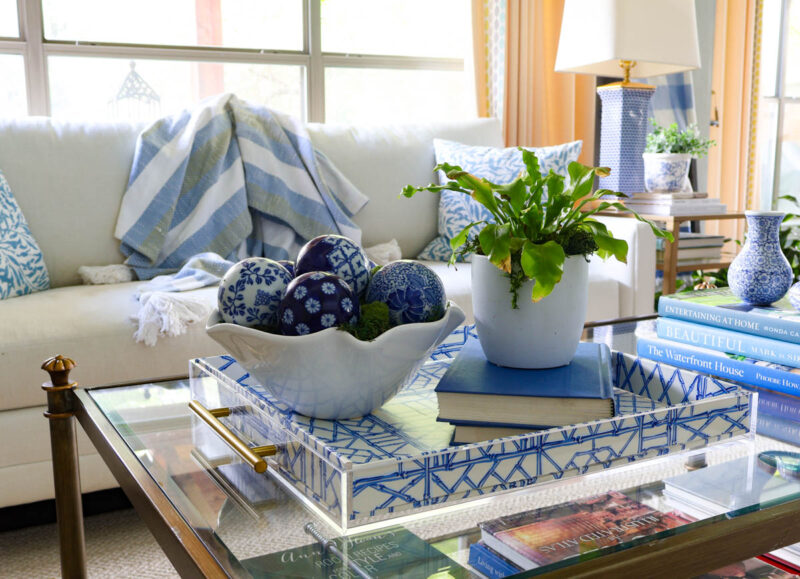 blue decorative acrylic tray on coffee table