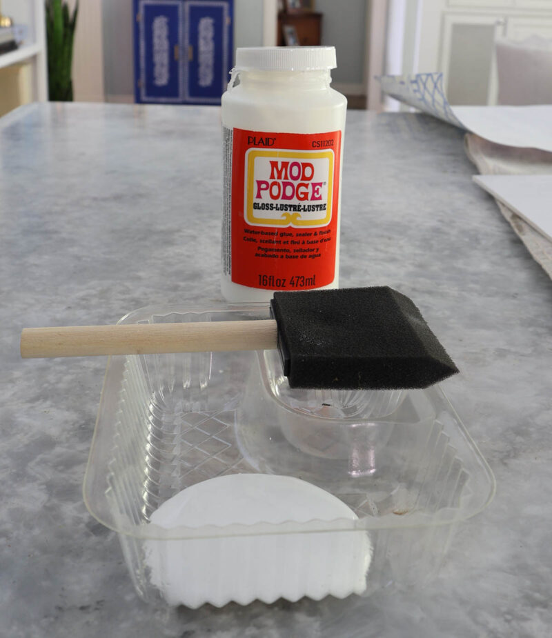 Mod Podge jar and foam brush