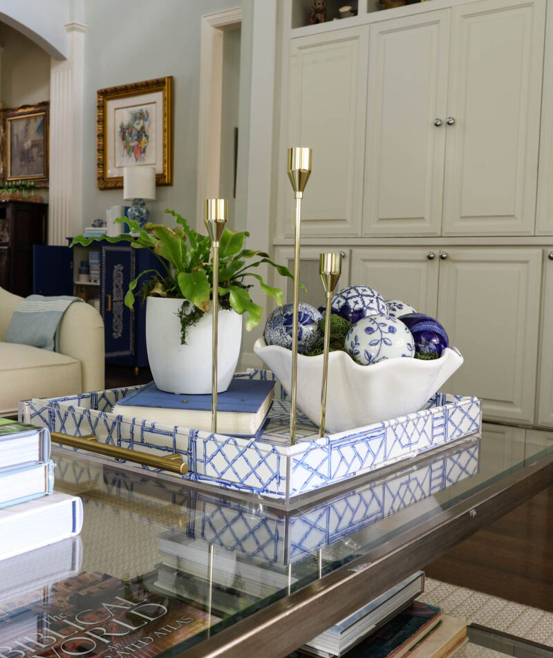 blue decorative acrylic tray on coffee table