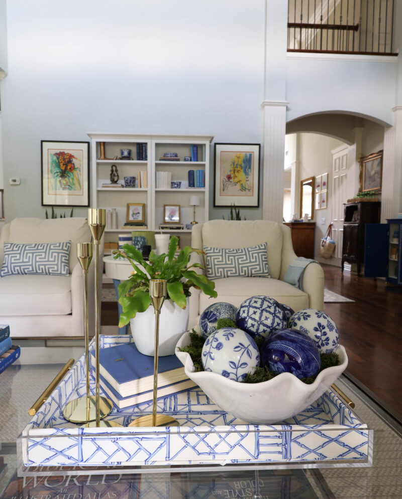 blue decorative acrylic tray on coffee table