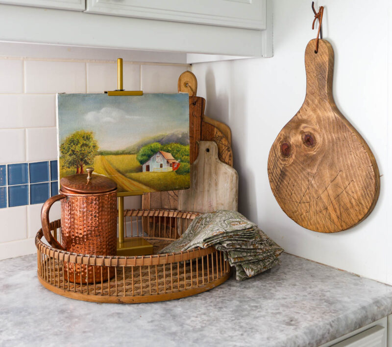 fall decor vignette with copper pitcher