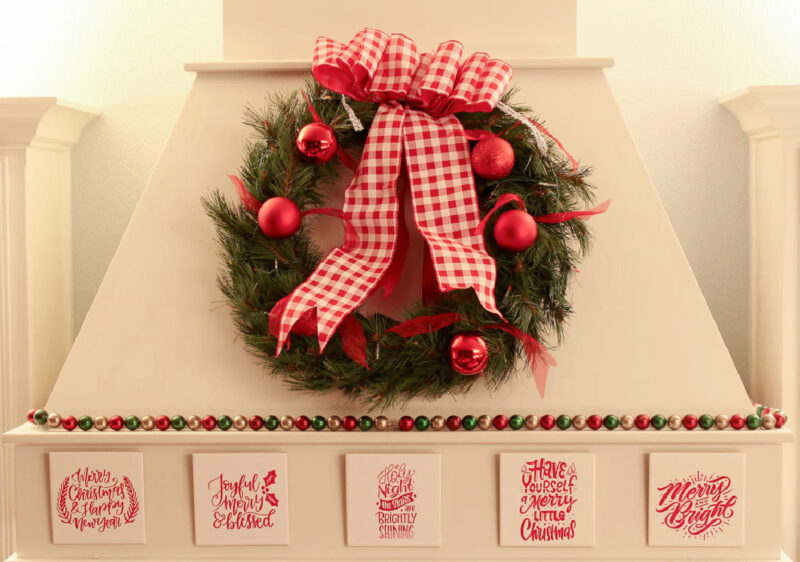tiles on stove top hood with Christmas scenes