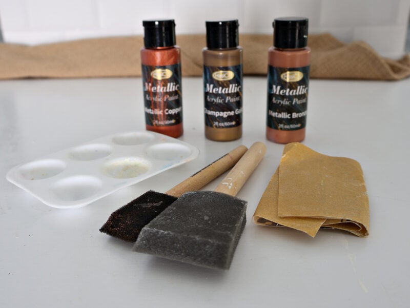 three colors of metallic paint