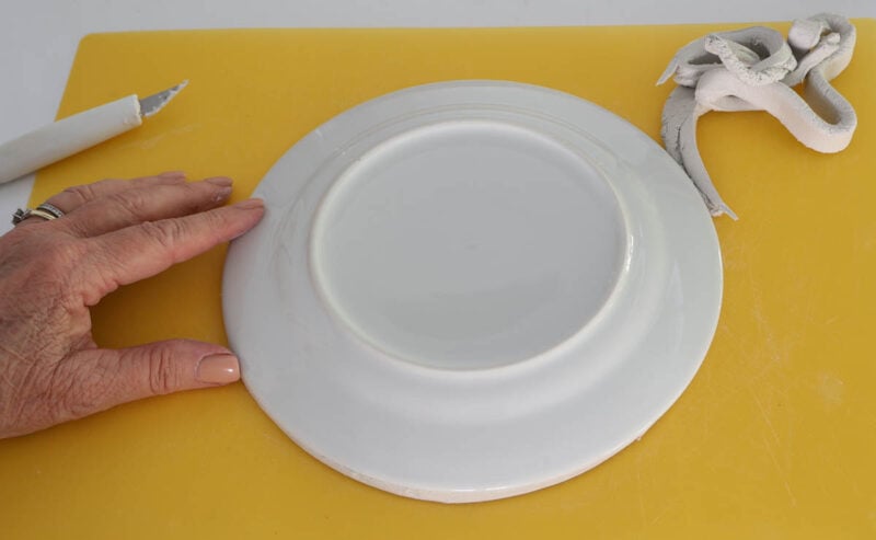 circle of clay with excess clay