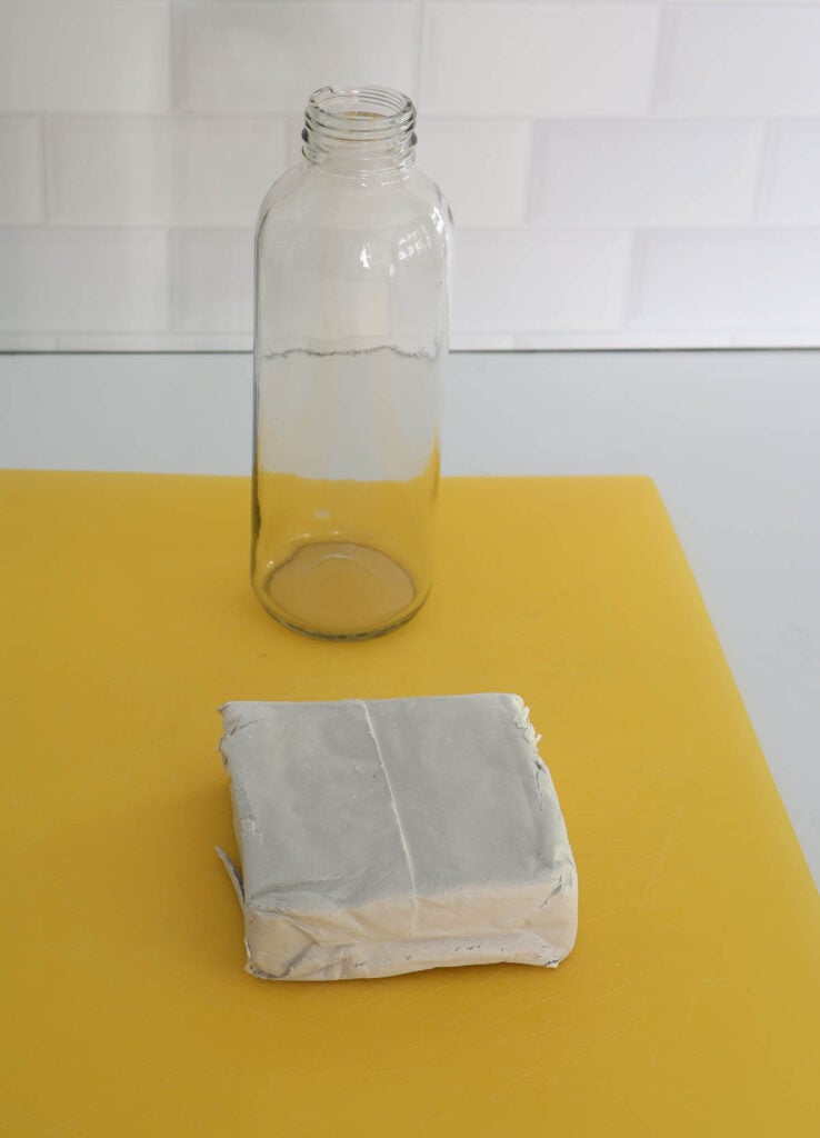glass bottle for rolling out clay