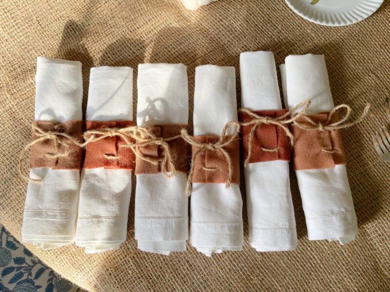 six napkins with felt and twine napkin rings