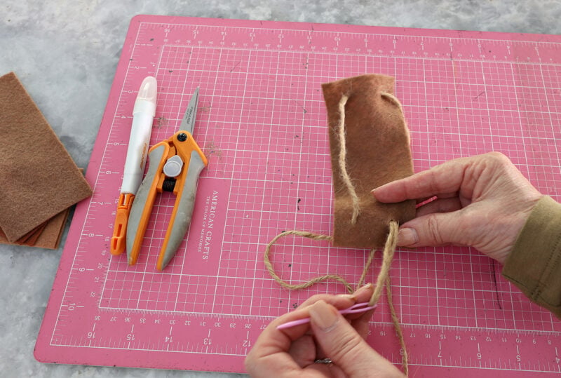twine through piece of felt